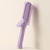 Retractable curling comb