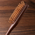 Wooden massage comb