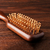 Wooden massage comb