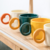 Ceramic cup with a heart - shaped handle
